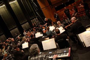 BNMO full symphonic orchestra rehearsing with The Nylons