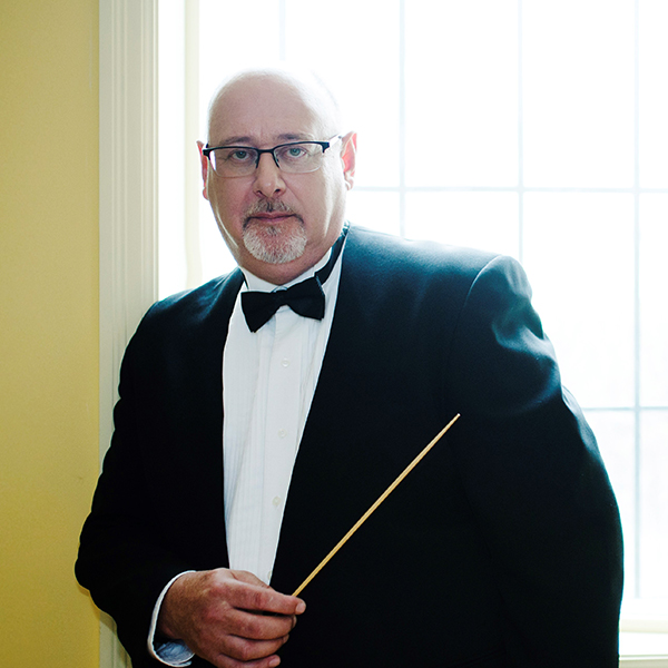 Burlington New Millennium Orchestra conductor Charles Cozens